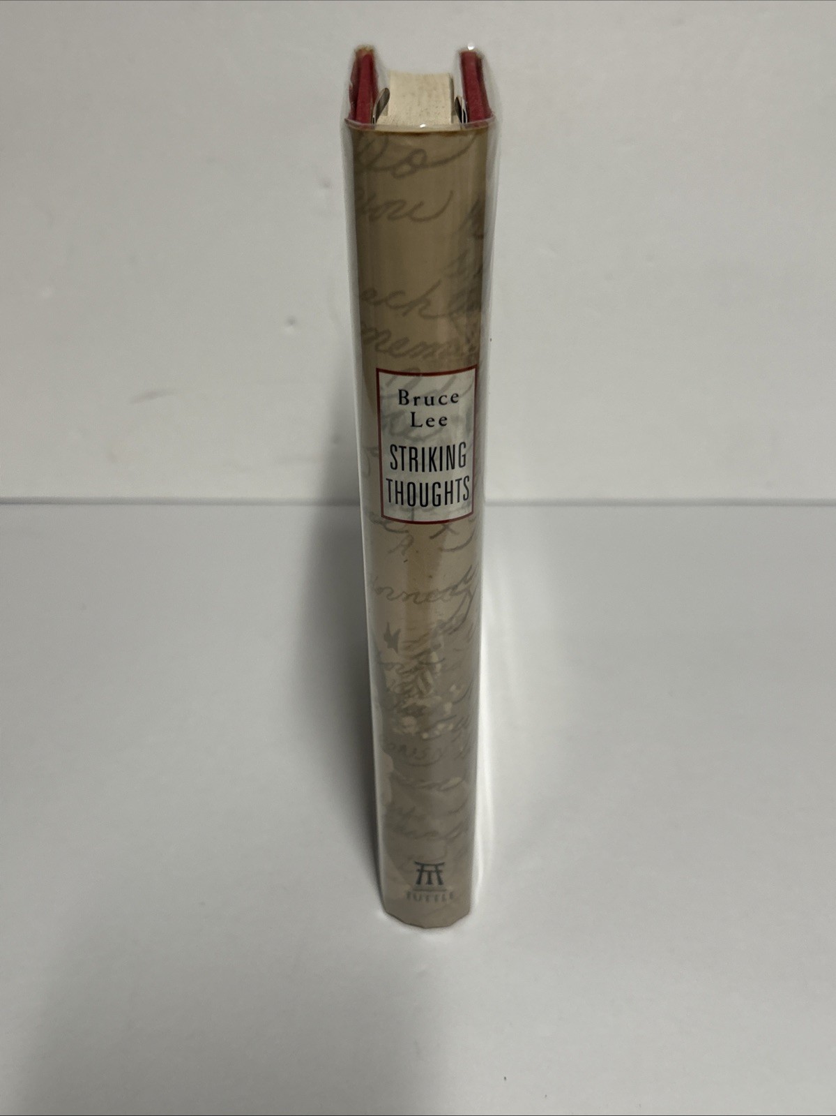 Striking Thoughts: Bruce Lee’s Wisdom for Daily Living By Bruce Lee 2000 1st HC