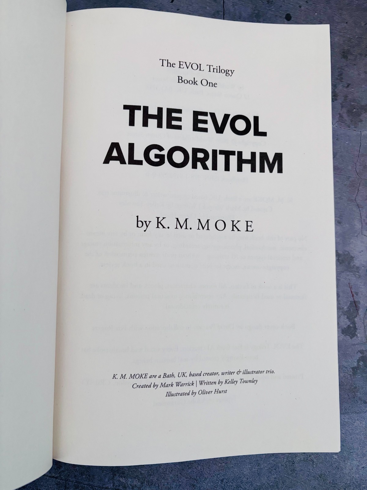 The EVOL Algorithm K. M. Moke HC 2026 UK Import Sci-Fi Trilogy VG+ UNREAD