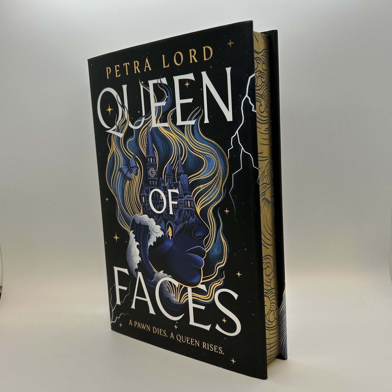 Queen of Faces Petra Lord Fantasy 1st Edition 2026 HB Book Sprayed Edges Guilded