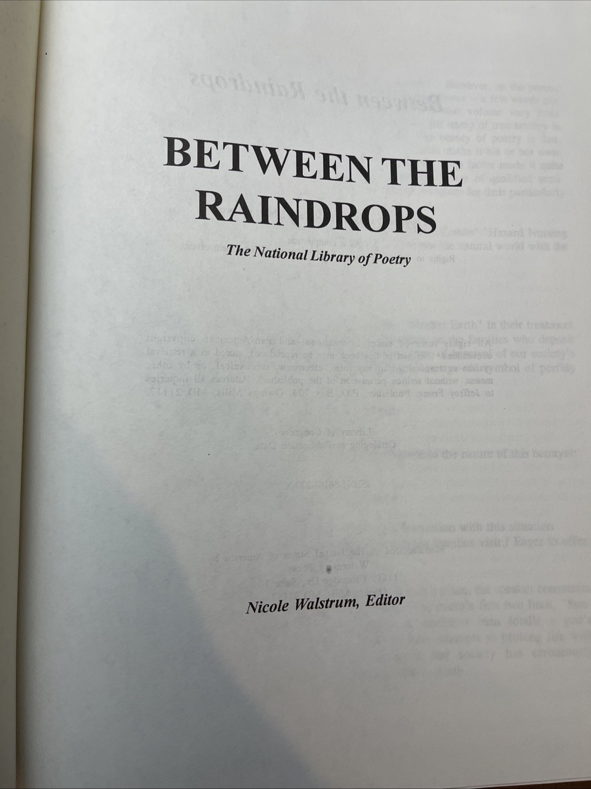 Between The Raindrops-The National Library of Poetry-Nicole Walstrum Editor