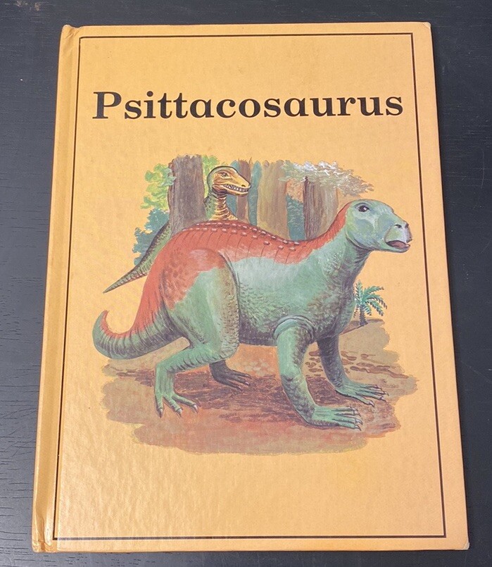 Vintage Rourke Dinosaur Library 7 Books Yellow Orange Peach Decorative Bookshelf