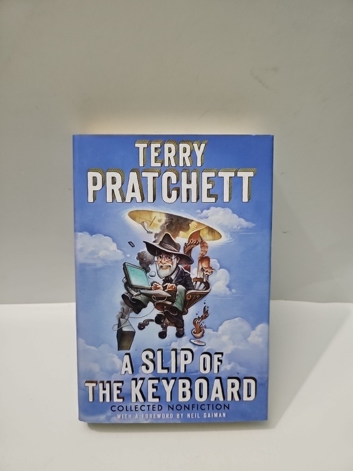 A SLIP OF THE KEYBOARD Terry Pratchett HCDJ 1st Ed 1st Printing