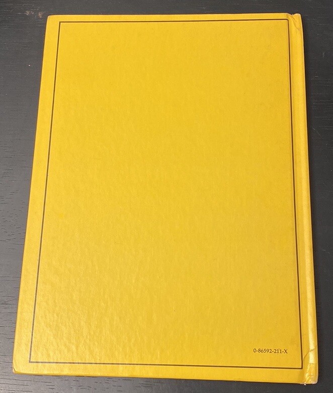 Vintage Rourke Dinosaur Library 7 Books Yellow Orange Peach Decorative Bookshelf