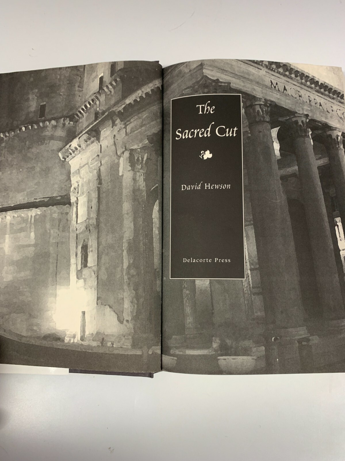 Delacorte Press The Sacred Cut by David Hewson A Novel Of Suspense Hardcover