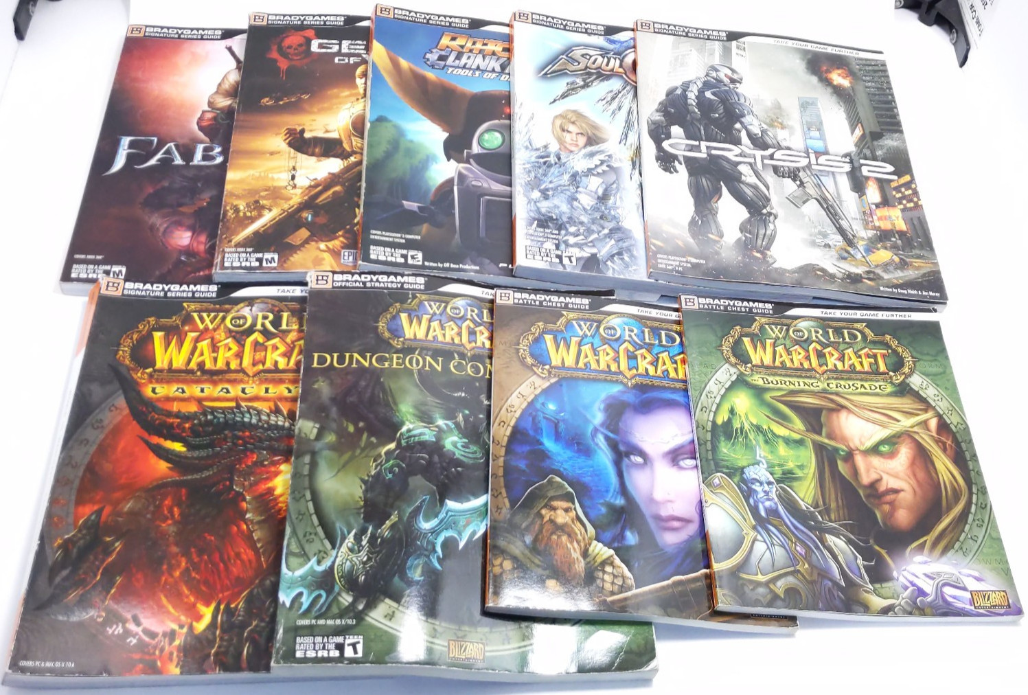 Lot Of 9 BradyGames Strategy Guide World of Warcraft, Crysis, Soulcalibur