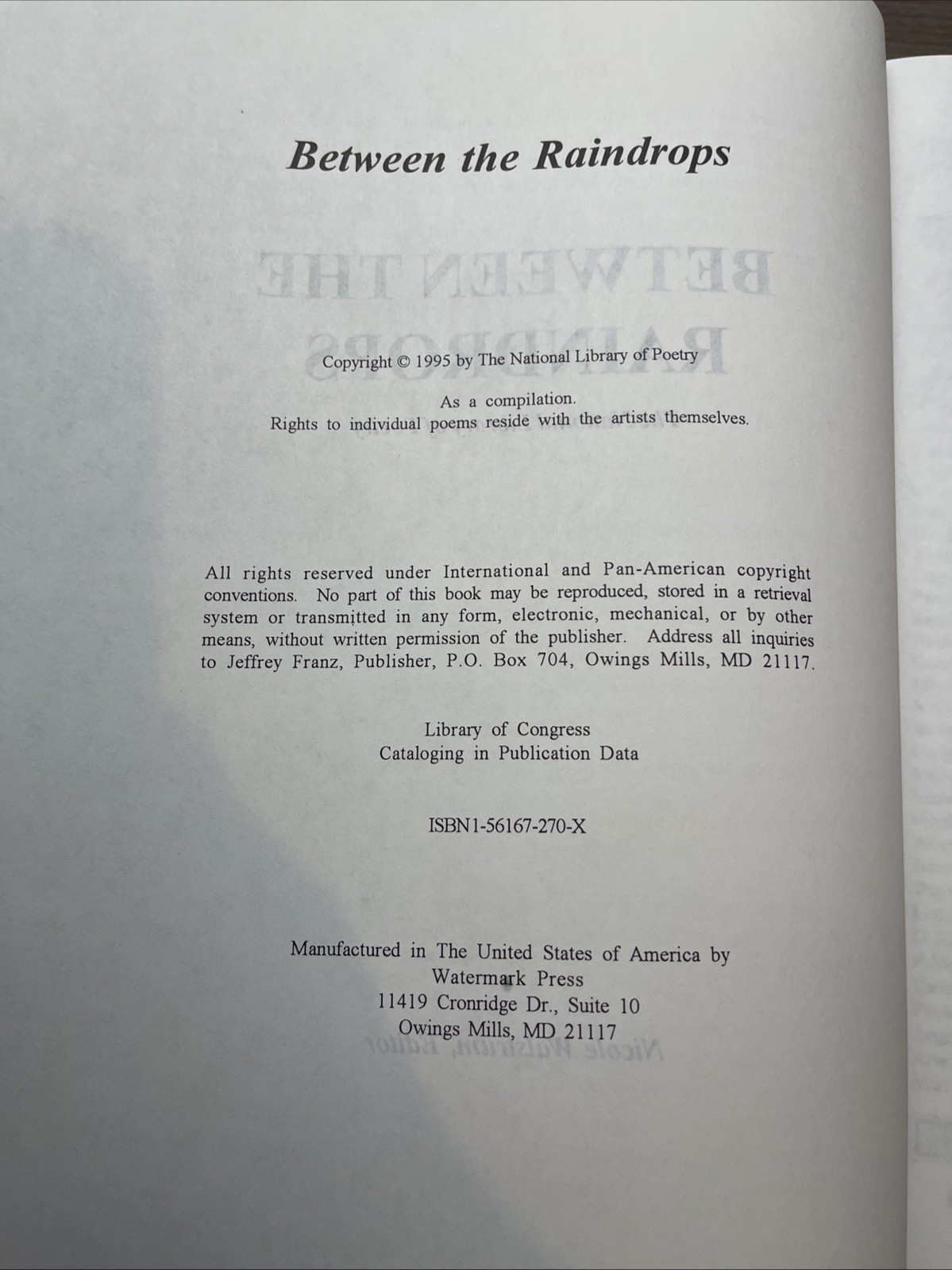 Between The Raindrops-The National Library of Poetry-Nicole Walstrum Editor