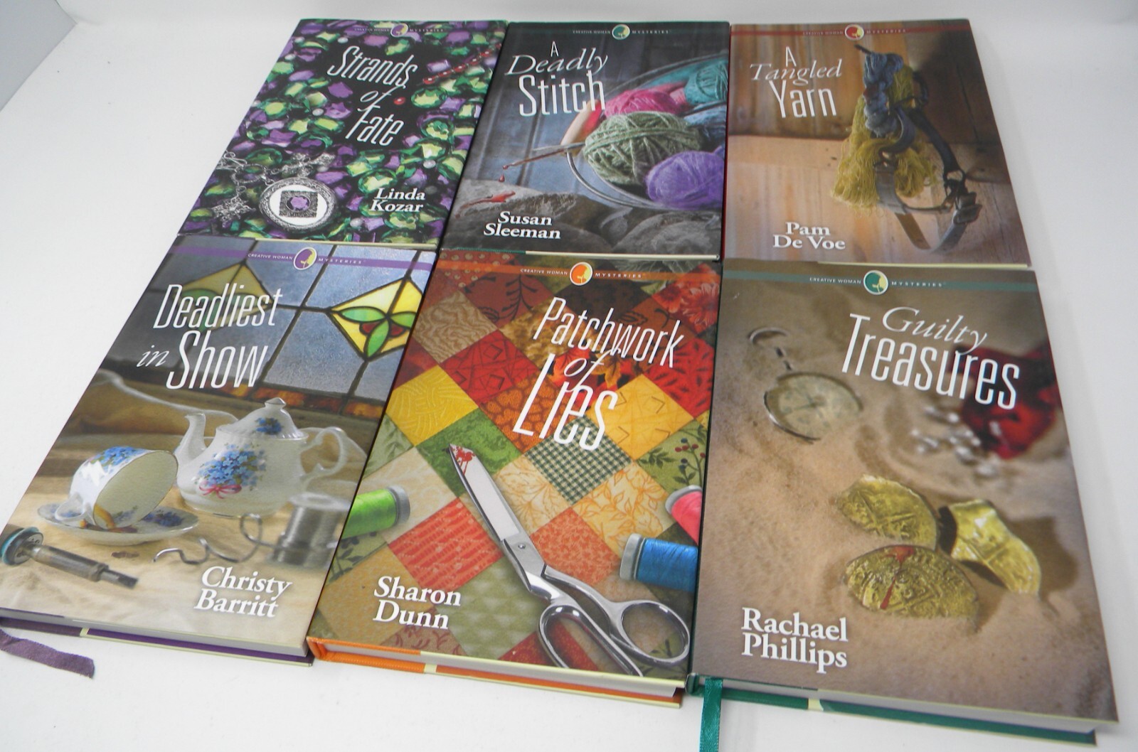 Lot 10 Annie’s Creative Women Mysteries Books 1-9,11