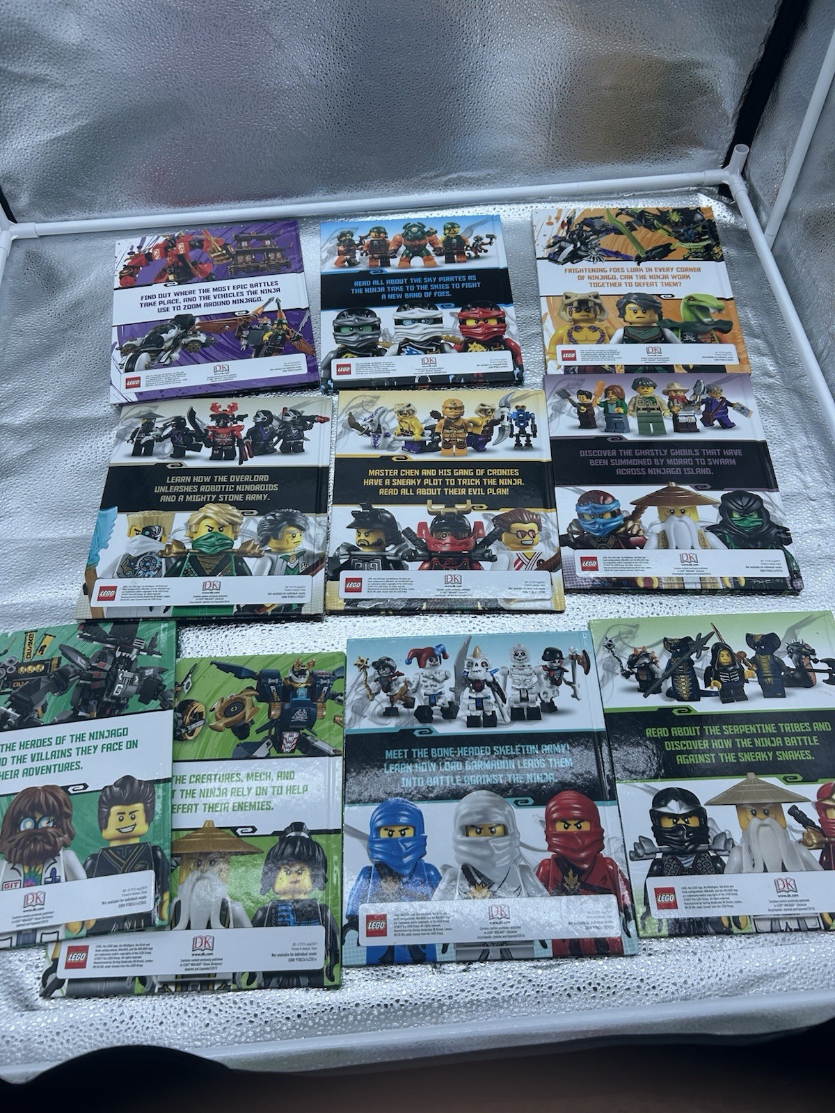 LEGO NINJAGO 10-BOOK COLLECTION MASTERS OF SPINJITZU WITH BOOK HOLDER- USED