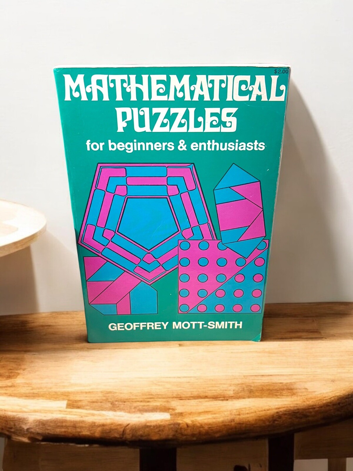 Mathematical Puzzles for Beginners & Enthusiasts by Geoffrey Mott-Smith – Dover