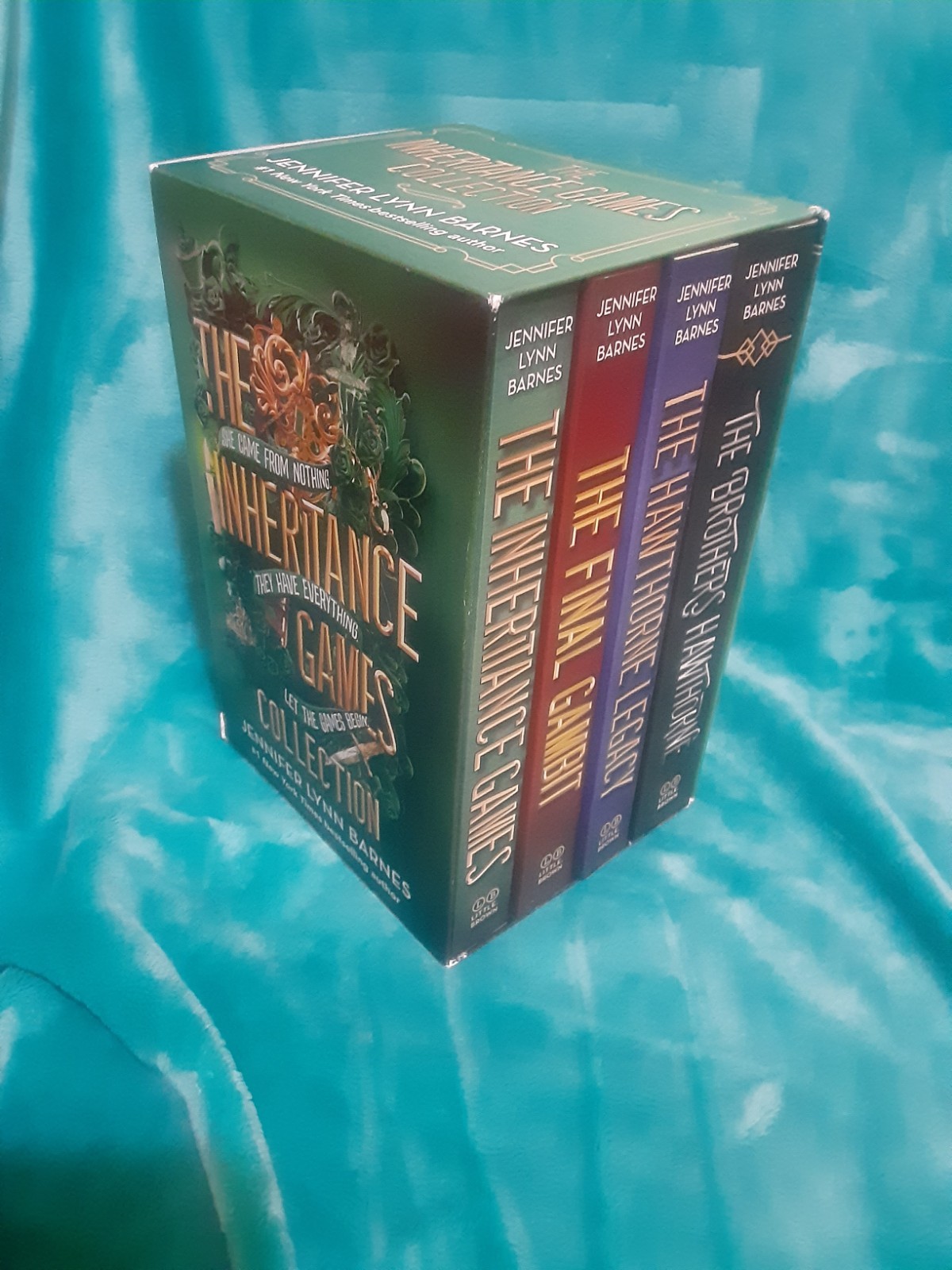 The Inheritance Games Collection by Jennifer Lynn Barnes. 4 Book box set! =]