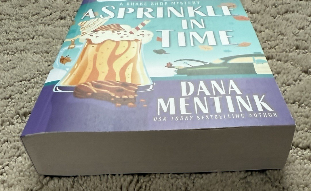 A Sprinkle in Time Shake Shop Mystery Paperback Novel by Dana Mentink New