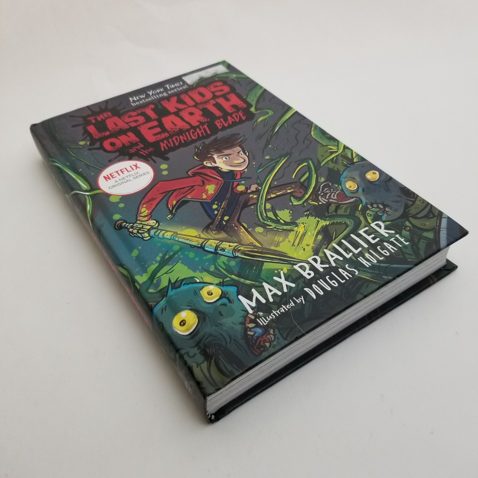 The Last Kids on Earth and the Midnight Blade by Douglas Holgate & Max Brallie.