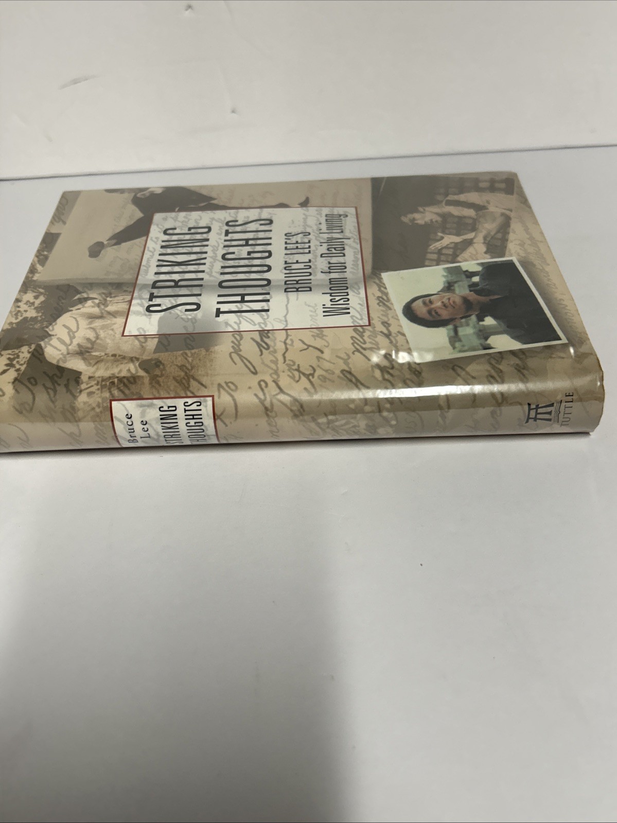 Striking Thoughts: Bruce Lee’s Wisdom for Daily Living By Bruce Lee 2000 1st HC