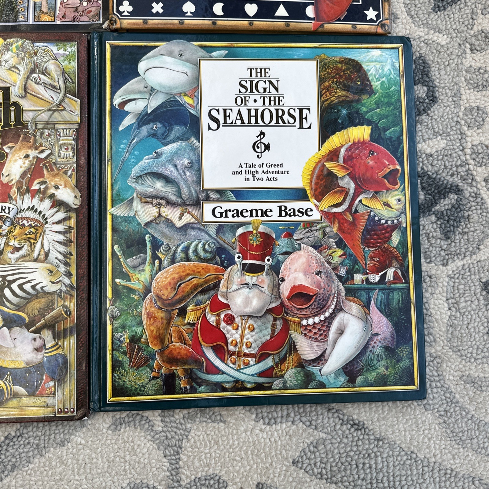Lot of 4 Graeme Base Books Animalia Enigma Seahorse Eleventh Hour