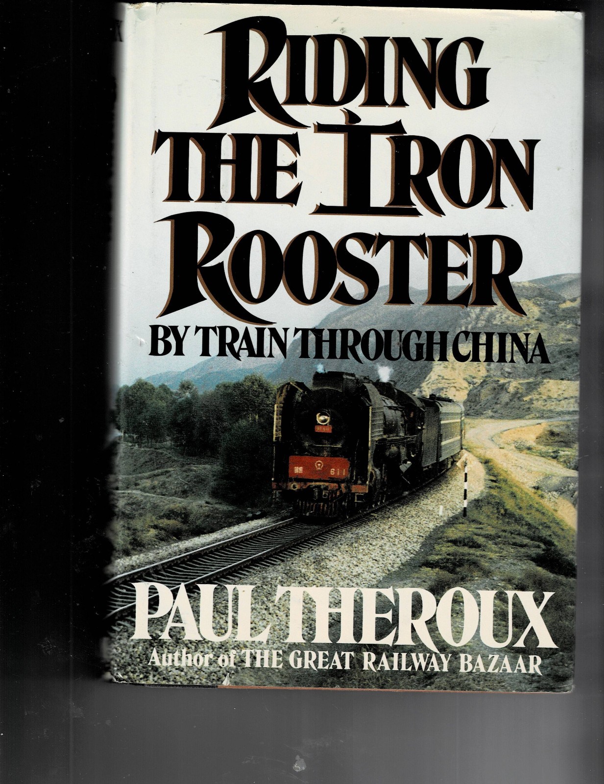 Riding the Iron Rooster: By Train Through China Hardcover by Paul Theroux