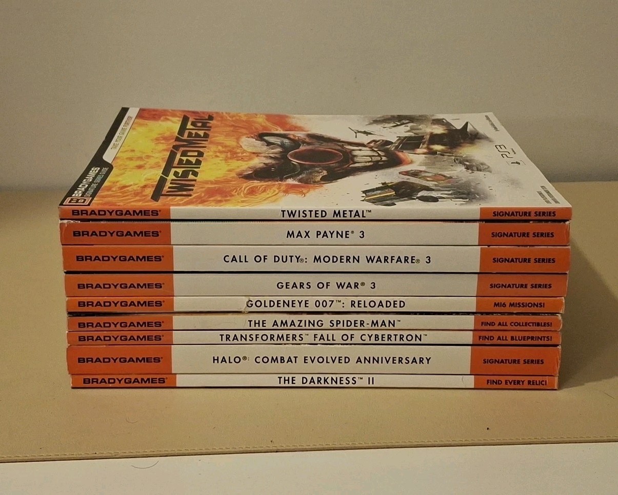 Lot of 9 Video Game Strategy Guides Spider-Man, Twisted Metal, Halo, COD, 007
