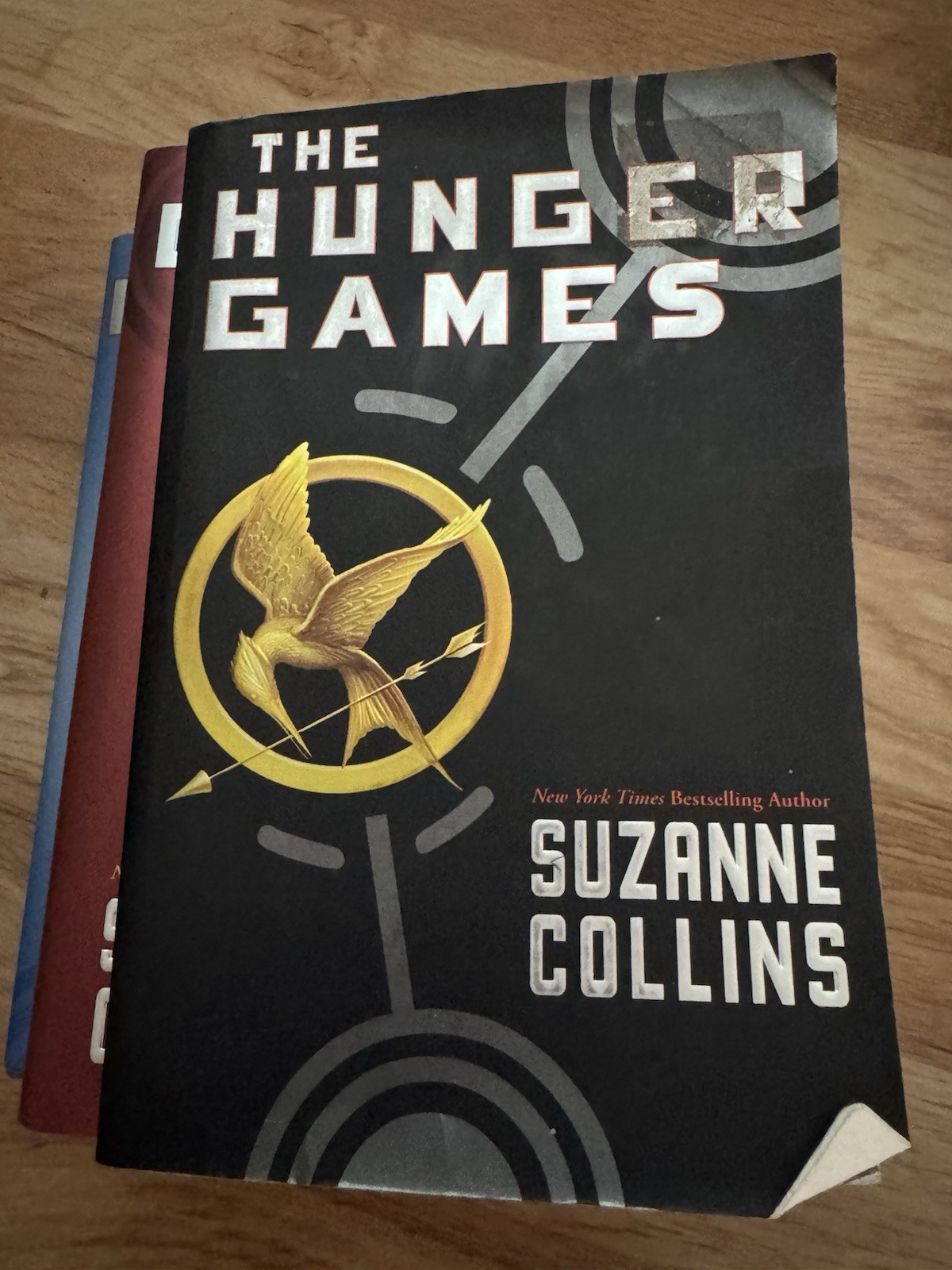 The Hunger Games Trilogy by Suzanne Collins, Paperback, Scholastic, YA Dystopian