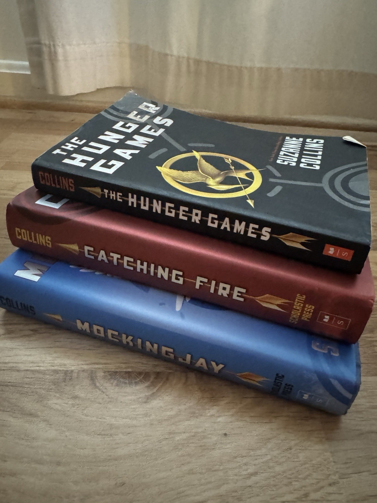 The Hunger Games Trilogy by Suzanne Collins, Paperback, Scholastic, YA Dystopian