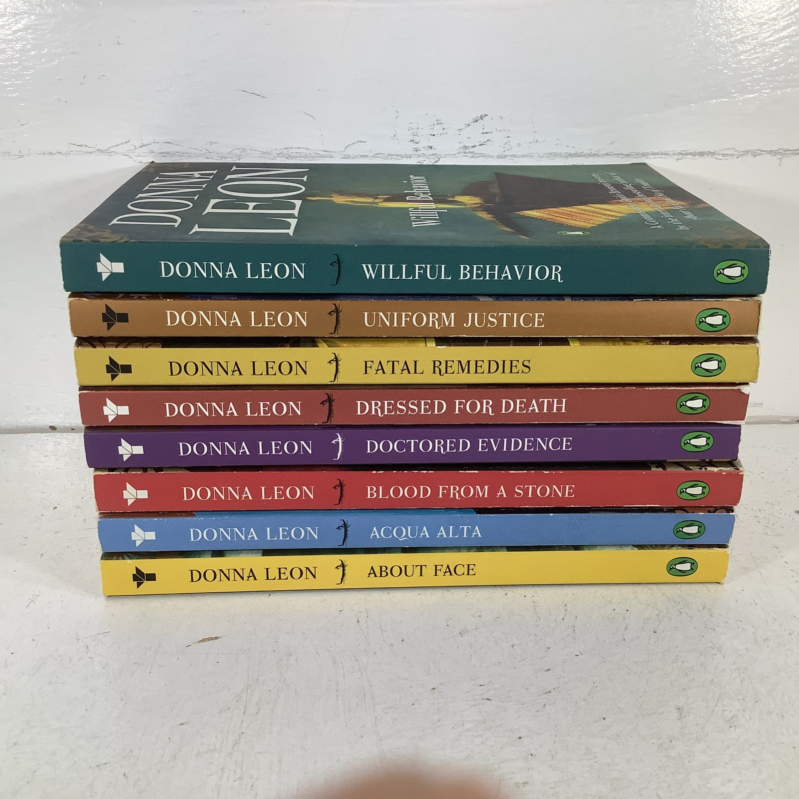 Donna Leon lot of 8 Commissario Guido Brunetti Mystery Series Trade PB Like New