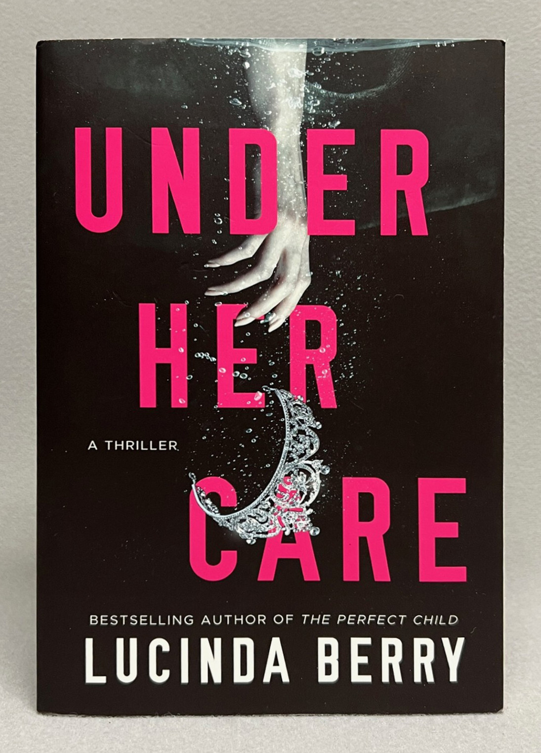 UNDER HER CARE: A Thriller (2022) PAPERBACK By Lucinda Berry