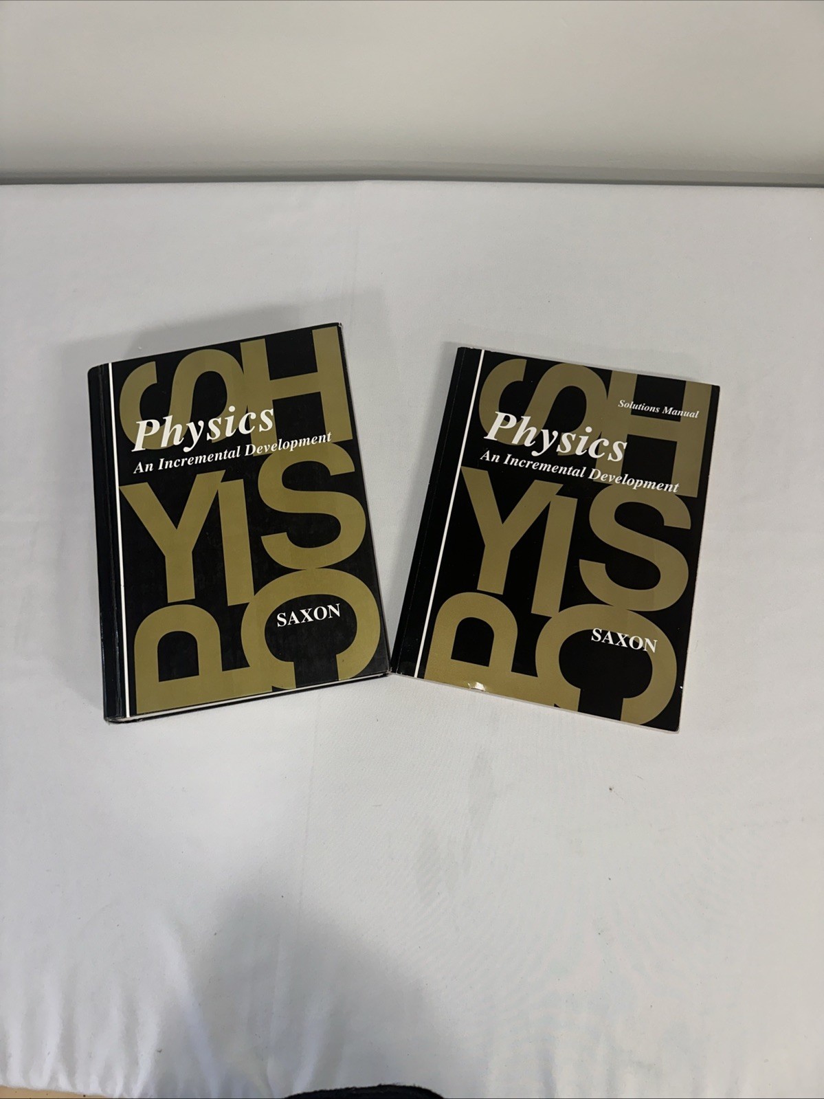 Physics :An Incremental Development Textbook & Solution Manual by John H. Saxon