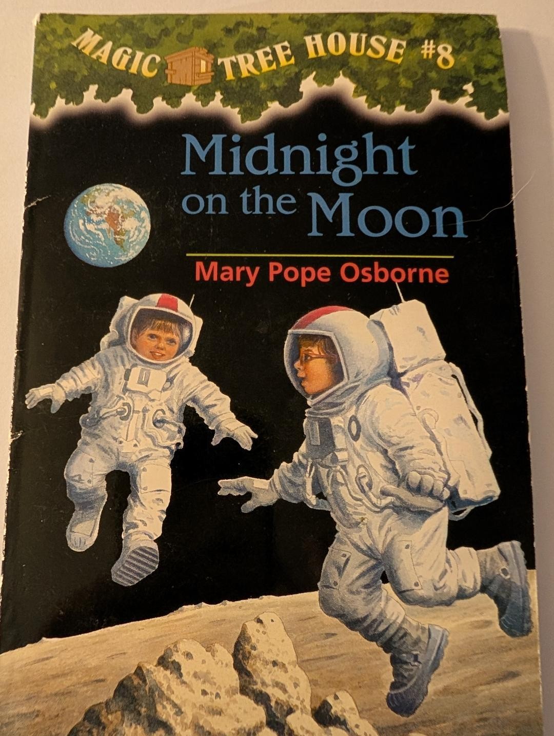 Childrens Book – Midnight on the Moon By Mary Pope Osborne Gently Used
