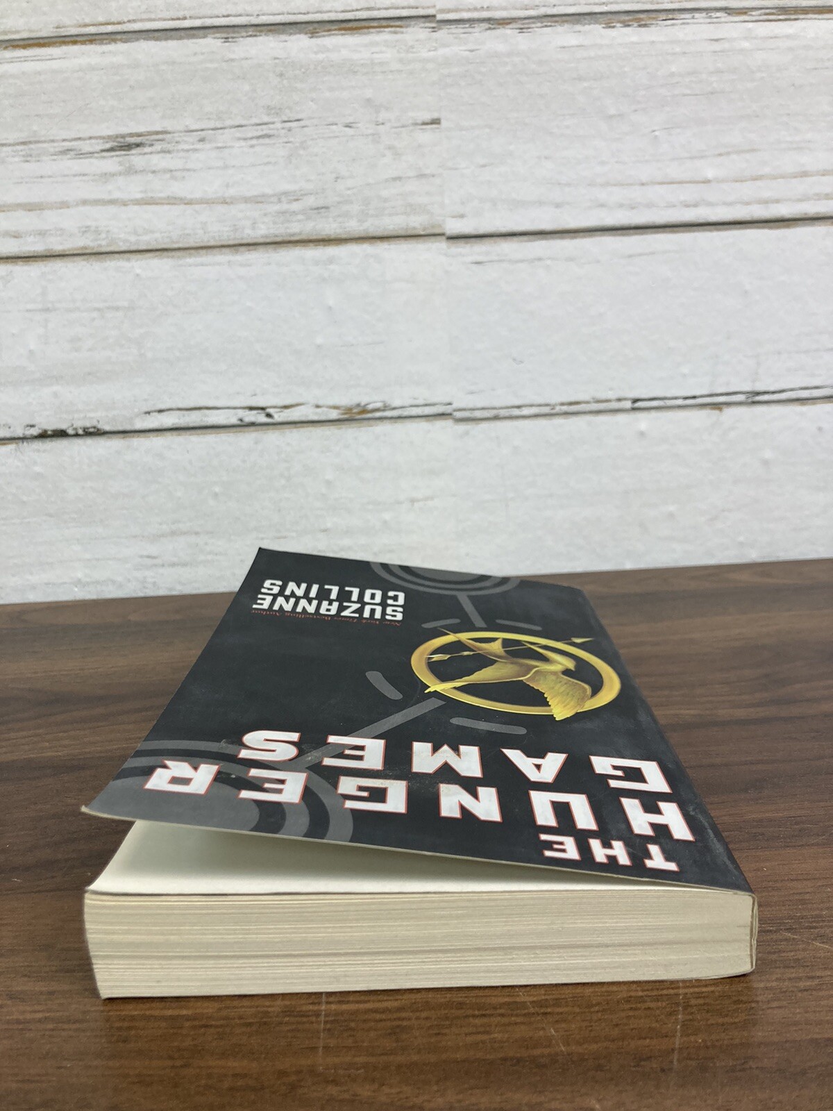 The Hunger Games Book Paperback By Suzanne Collins 1st Scholastic Edition 2009