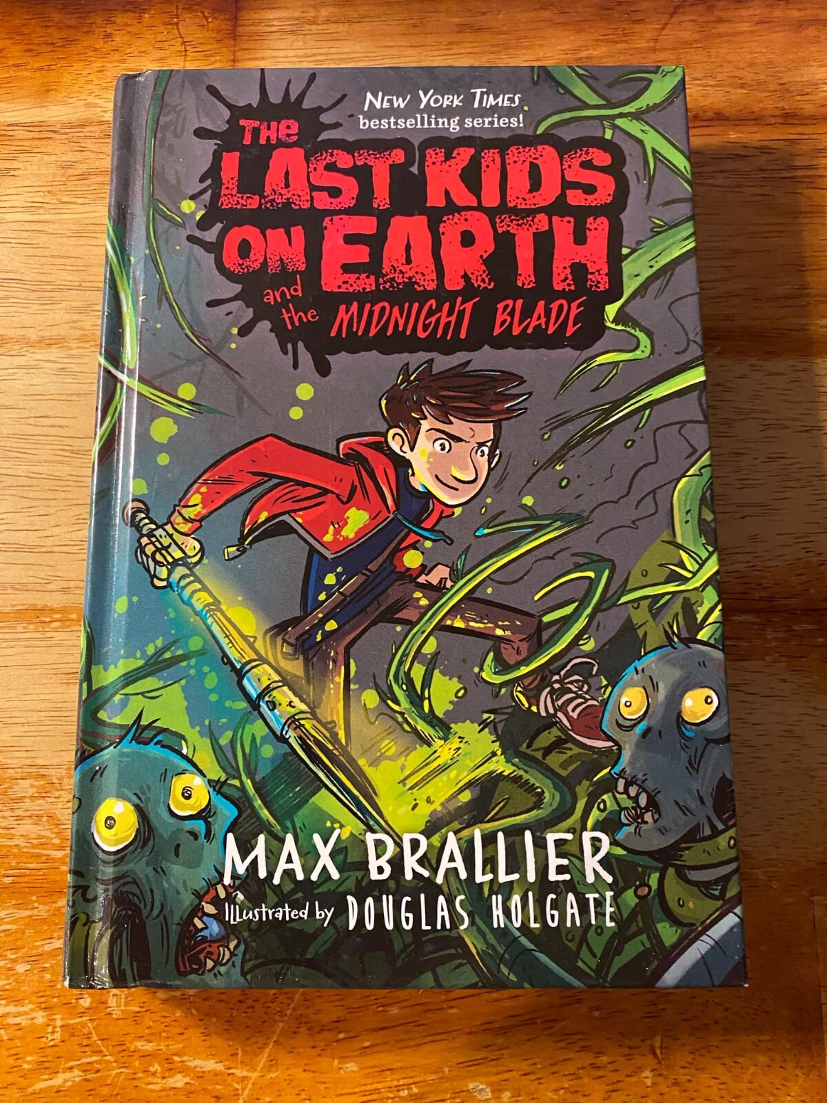 Last Kids on Earth and the Midnight Blade by Max Brallier and Douglas Holgate…