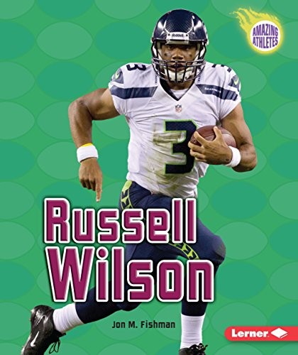 RUSSELL WILSON (AMAZING ATHLETES) By Jon M. Fishman *Excellent Condition*
