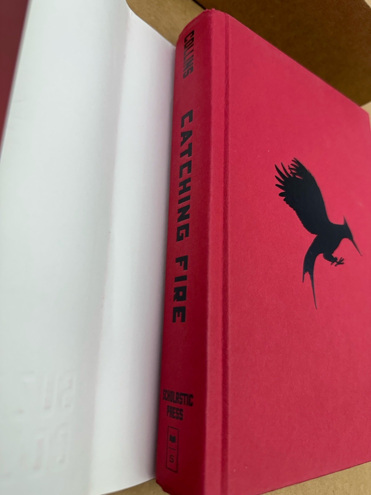 Catching Fire by Suzanne Collins 1st Edition 2009 Hardcover Dust Jacket