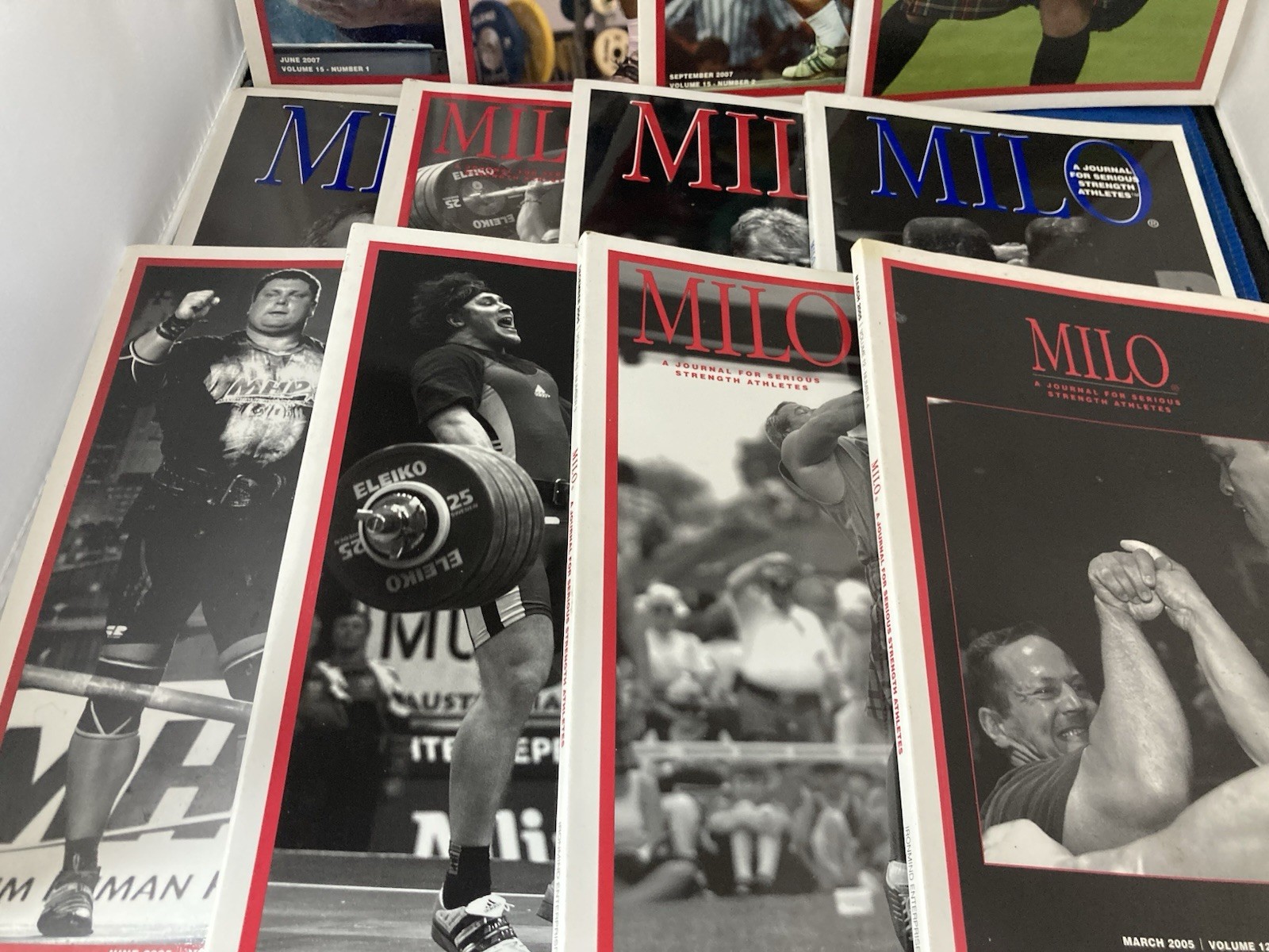 WEIGHTLIFTING-MILO JOURNALS FOR SERIOUS STRENGTH ATHLETES. LOT OF 12. 2005-2007