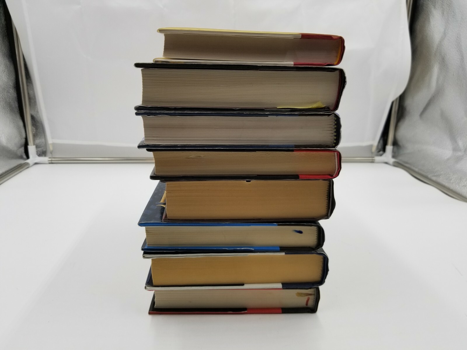 Lot of 8 Books Oliver North Ken Follet & more. See pictures