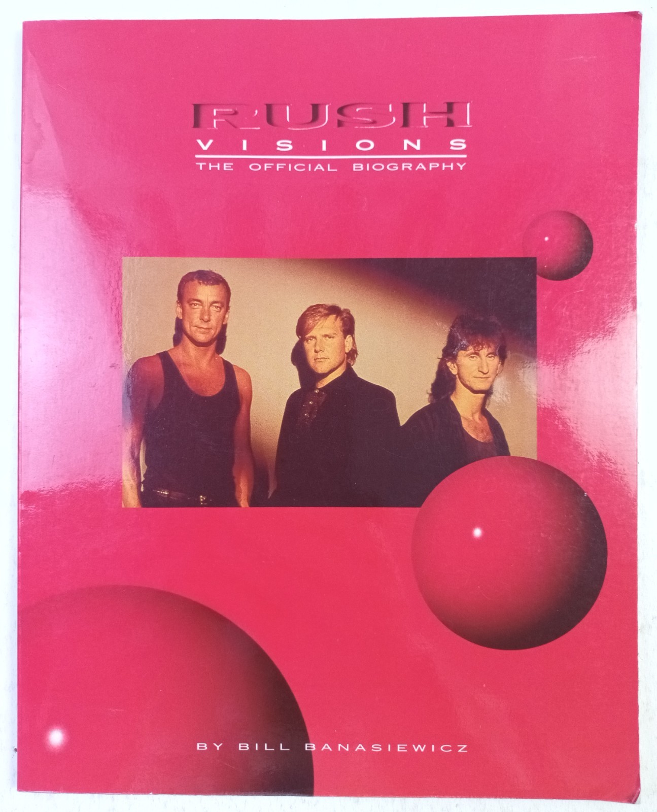 RUSH VISIONS: THE OFFICIAL BIOGRAPHY. BILL BANASIEWICZ. OMNIBUS PRESS 1988. VGD