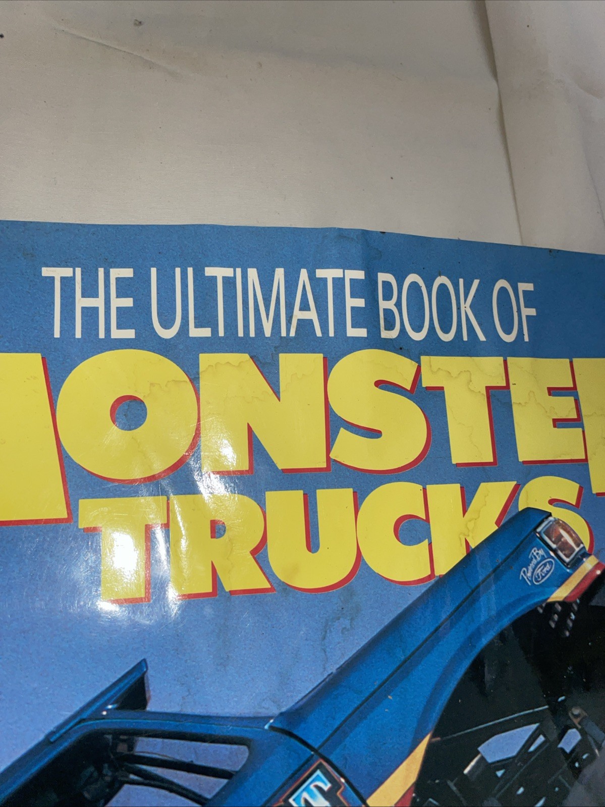 ULTIMATE BOOK OF MONSTER TRUCKS By Bill Holder – As Is Damage Bigfoot Ford 1990