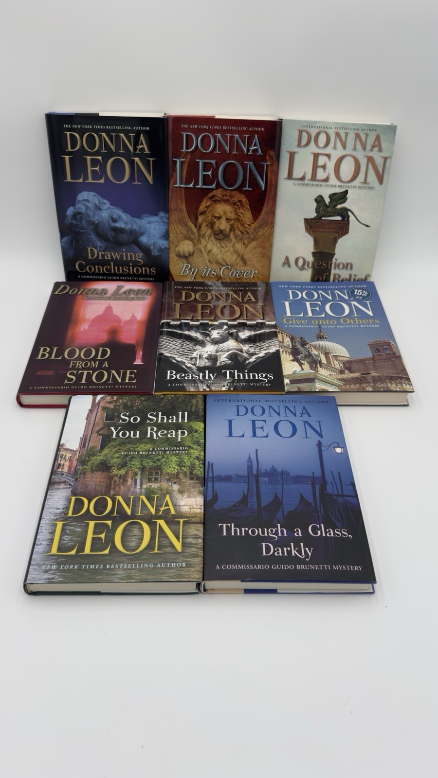 Donna Leon Hardcover Book Lot: A Commissario Guido Brunetti Mystery LOT OF 16