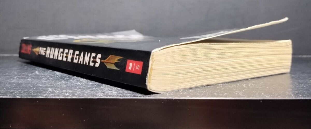 The Hunger Games – Suzanne Collins – 2010 Scholastic – Young Adult Fiction / Dys