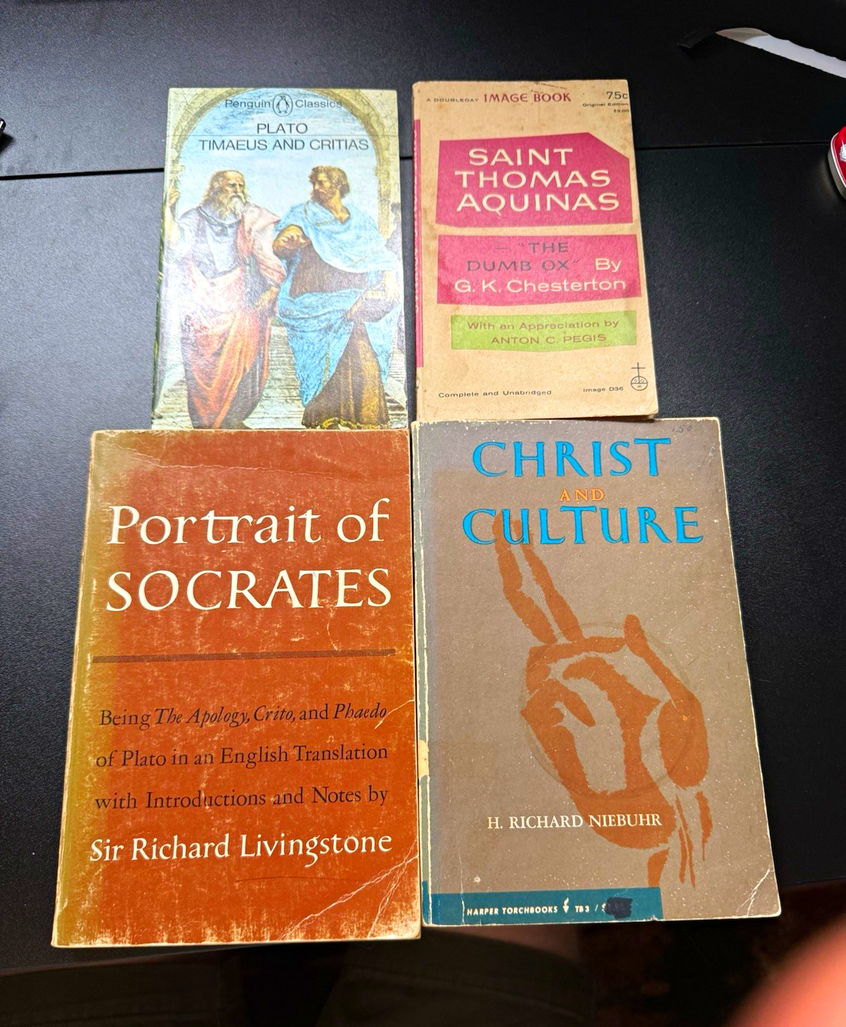 Plato, Niebuhr, Chesterton paper back books. Theology and philosophy.