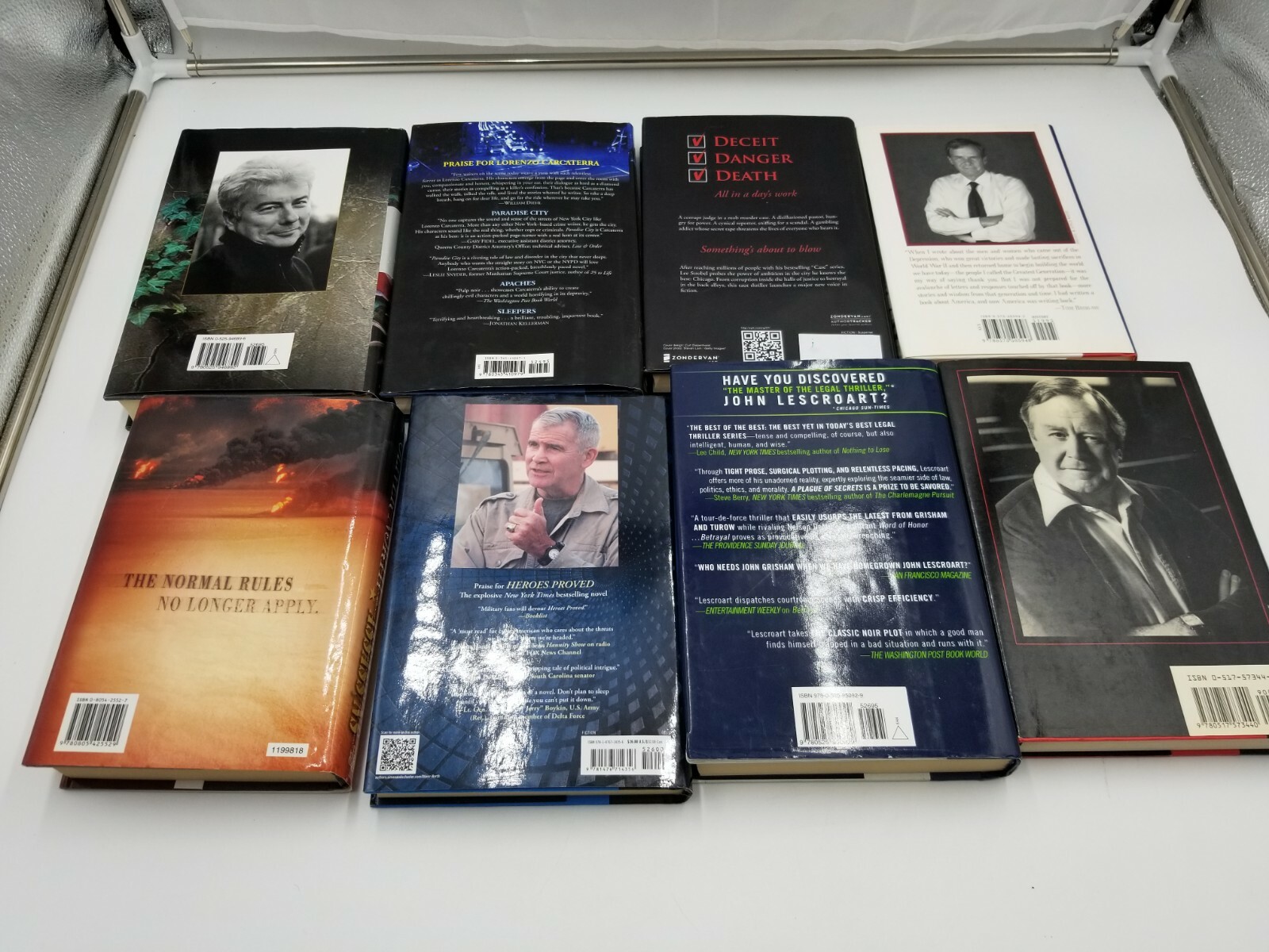 Lot of 8 Books Oliver North Ken Follet & more. See pictures