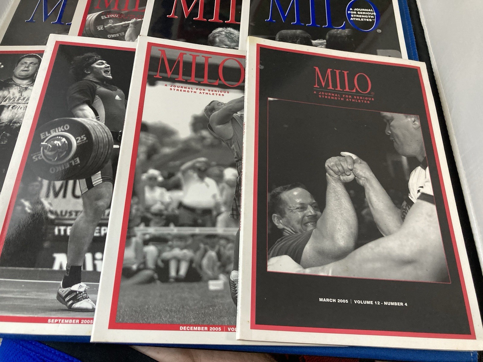 WEIGHTLIFTING-MILO JOURNALS FOR SERIOUS STRENGTH ATHLETES. LOT OF 12. 2005-2007