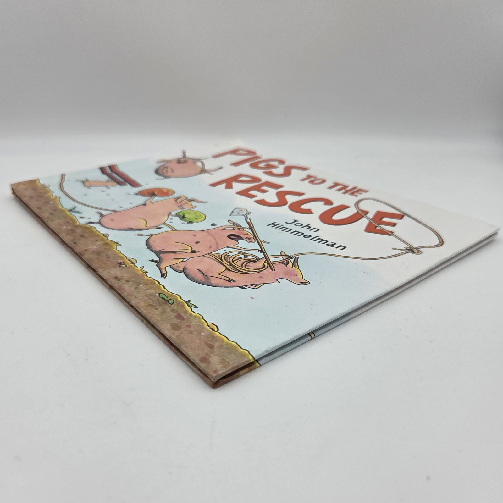Pigs to the Rescue: A Picture Book by John Himmelman – Kid’s Stories Ships Fast