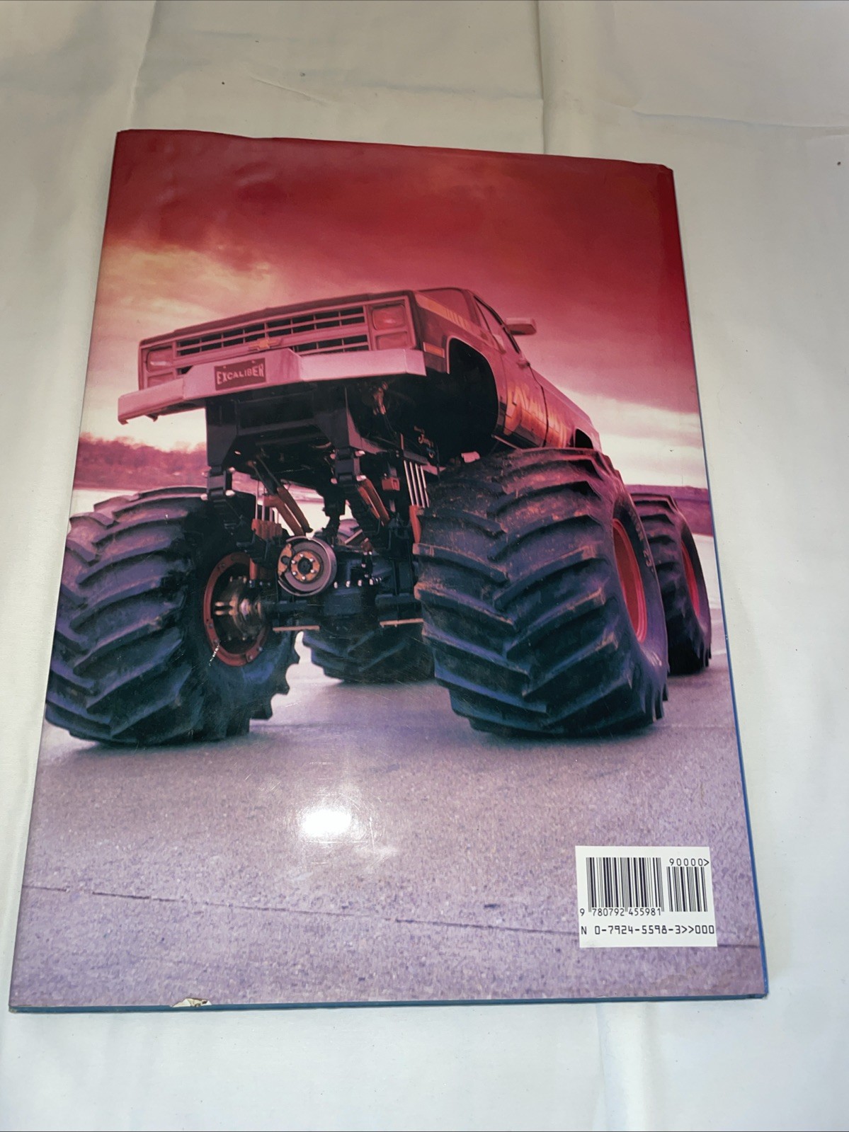 ULTIMATE BOOK OF MONSTER TRUCKS By Bill Holder – As Is Damage Bigfoot Ford 1990