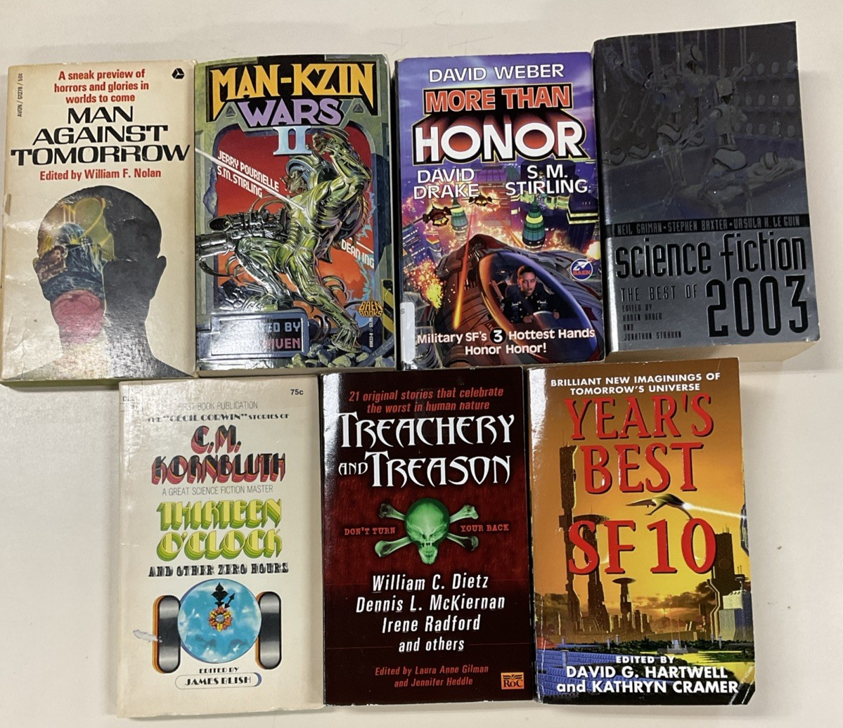 Sci Fi Anthologies PB lot of 14 Drake Pournell Kornbluth Gilman Le Guin & more