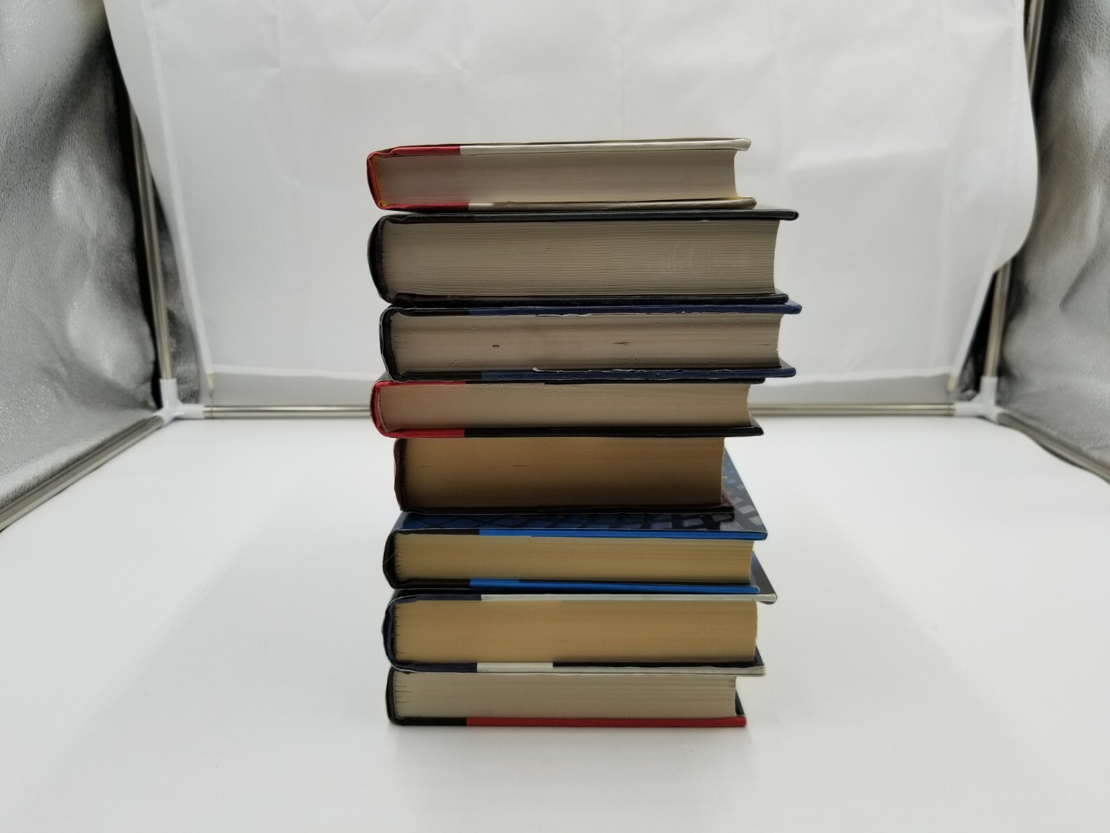Lot of 8 Books Oliver North Ken Follet & more. See pictures
