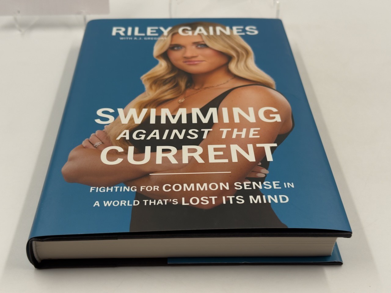 Swimming Against the Current, Riley Gaines, HC DJ 1st Ed Center Street 2024