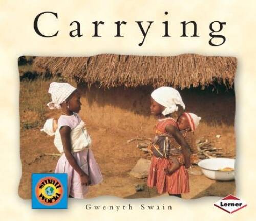 Carrying (Small World (Lerner Publishing)) – Paperback By Swain, Gwenyth – GOOD
