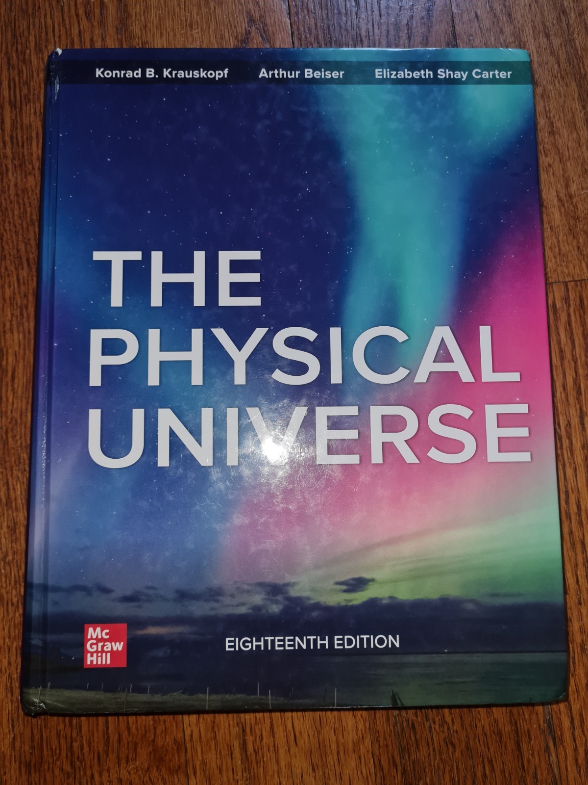 The Physical Universe ISE by Konrad B. Krauskopf Paperback Book. 18th Edition.