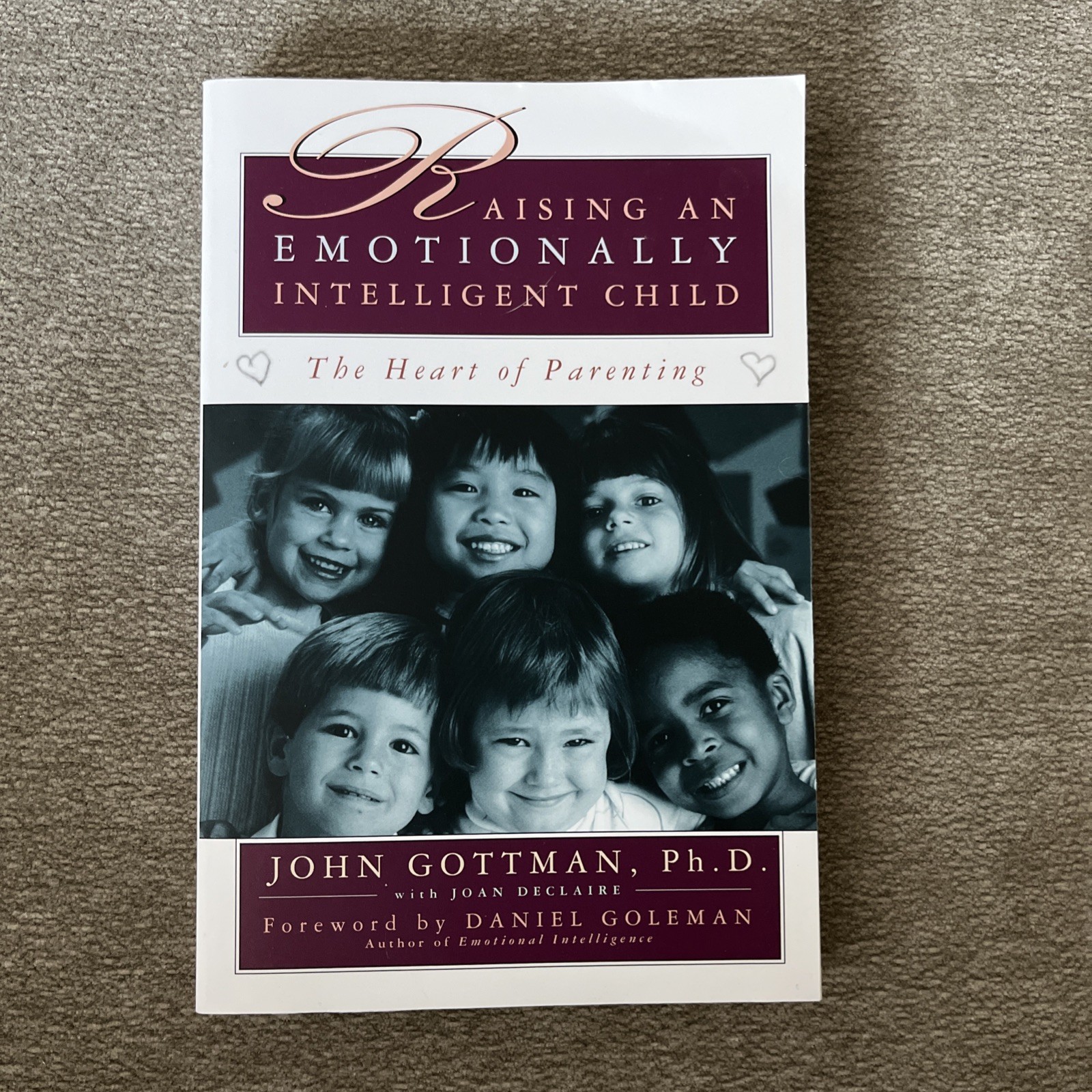 RAISING AN EMOTIONALLY INTELLIGENT CHILD John Gottman, Ph.D. with Joan Declaire