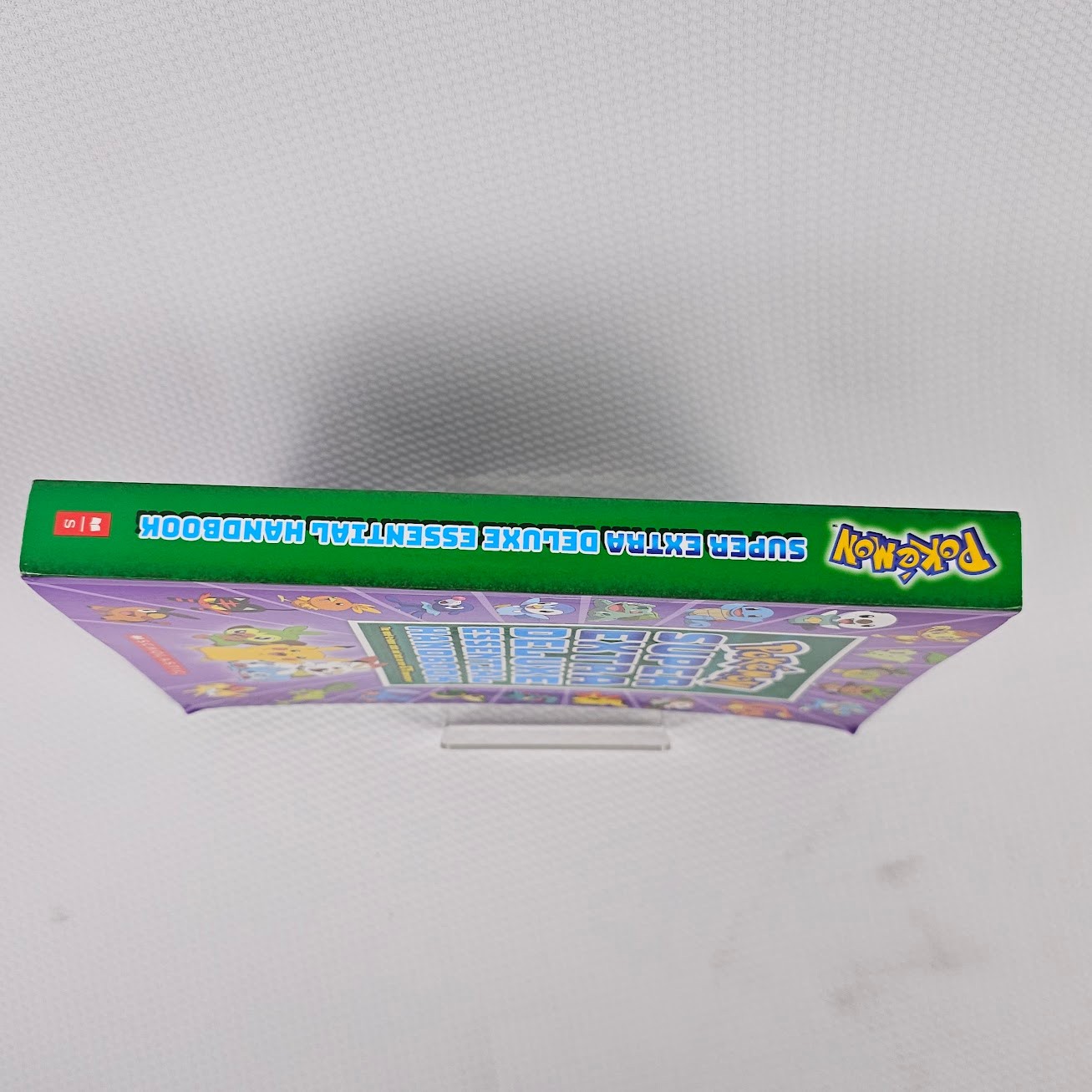 Pokémon Super Extra Deluxe Essential Handbook Schoolastic Paperback