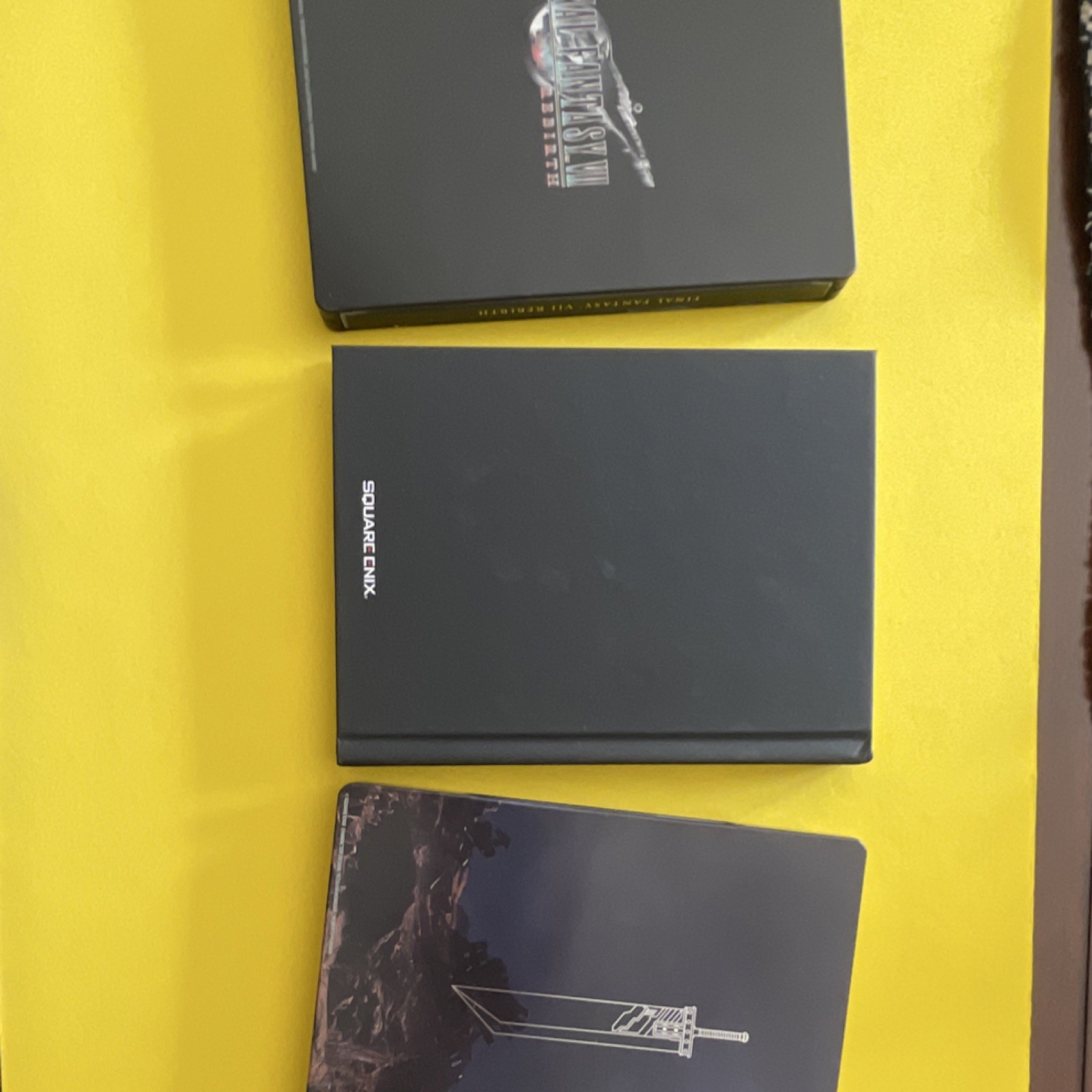 The Art of Final Fantasy VII Rebirth Hardcover Art Book and Two Steel Cases!