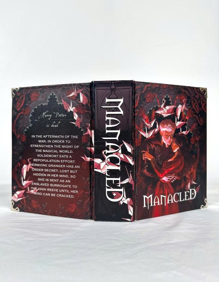 Limited edition hardcover Manacled book with 3 sided color spray bookmark card